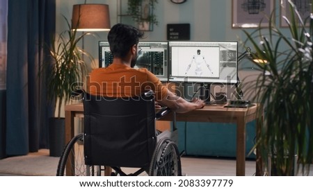 Anonymous handicapped man working with 3D model