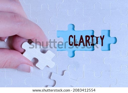 Sign displaying Clarity. Internet Concept Being coherent intelligible Understandable Clear ideas Precision Building An Unfinished White Jigsaw Pattern Puzzle With Missing Last Piece Royalty-Free Stock Photo #2083412554