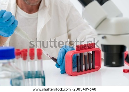 Scientific experiment in the laboratory of biological chemistry.Biochemistry, biophysics, and molecular biology is the study of chemical and physics processes within and relating to living organisms. Royalty-Free Stock Photo #2083489648