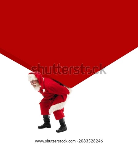 Santa Claus carrying large white gift box on his back isolated on white , big backgroun with copy space for text banner sign