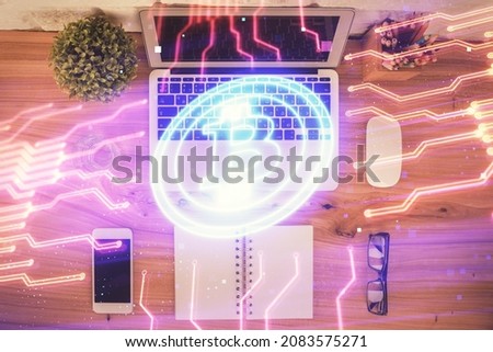 Blockchain theme hologram drawings over computer on the desktop background. Top view. Double exposure.