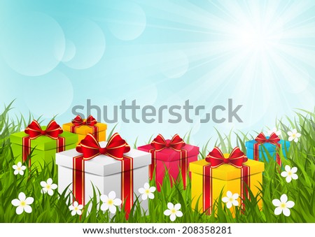 Gift boxes on green grass