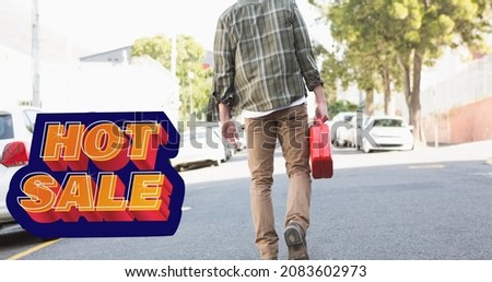 Digital composite image of hot sale text sign by man carrying petrol gallon walking on road in city. discount, transportation and lifestyle.