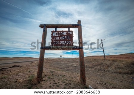 Welcome to Colorful Colorado post sign near Nebraska state border