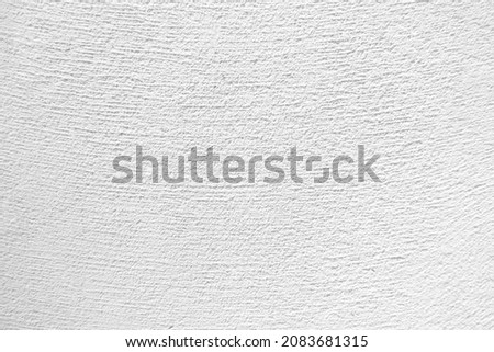 Seamless texture of white cement wall a rough surface, with space for text, for a background. 