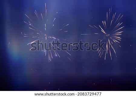 Magic abstract holiday background of sparkling fireworks. Christmas and New Year concept.