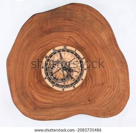 clock with abstract dial on wooden background