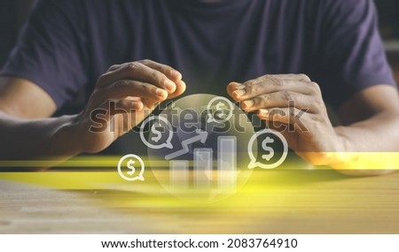 Man hold Financial Globe with money icon.