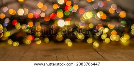Colorful background with defocused lights. Bokeh background. Christmas background with light spots and bokeh