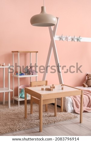 Stylish interior of modern children's room Royalty-Free Stock Photo #2083796914