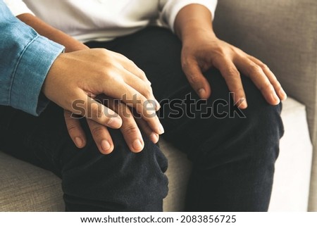 Christian families worship together, hand touch each other, helping hands Royalty-Free Stock Photo #2083856725