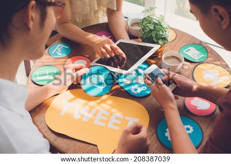 Group of designers working on icons for the application Royalty-Free Stock Photo #208387039