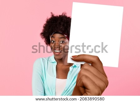 Happy African American Female Holding Blank White Card For Advertisement, Posing Smiling Looking At Camera Standing In Studio Over Pink Background, Showing Good Offer, Collage Royalty-Free Stock Photo #2083890580