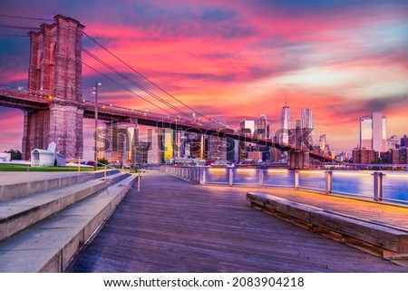 New York, United States. Amazing sunset skyline of Manhattan and Brooklyn Bridge, Brooklyn Bridge Park in New York City, USA.