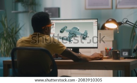 African American 3D designer working remotely from home