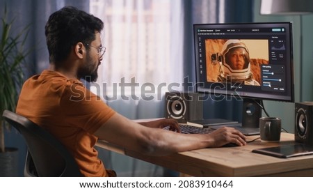 Indian retoucher working with astronaut photo