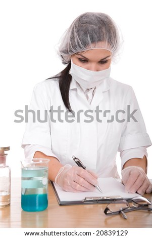 attractive brunette female doctor in laboratory