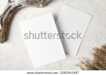 Two white invitation card mockup with pampas grass decoration 5x7