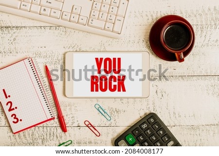 Conceptual caption You Rock. Conceptual photo slang phrase of praise or encouragement conveying you are awesome Display of Different Color Sticker Notes Arranged On flatlay Lay Background