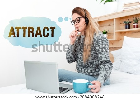 Conceptual caption Attract. Word Written on to draw by a physical force causing or tending to cause to approach Entrepreneur Checking And Reading Emails, Student Sending Messages Online