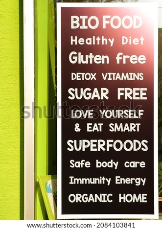 Billboard on healthy foods store facade with inspirational quotes healthy food promoting concept