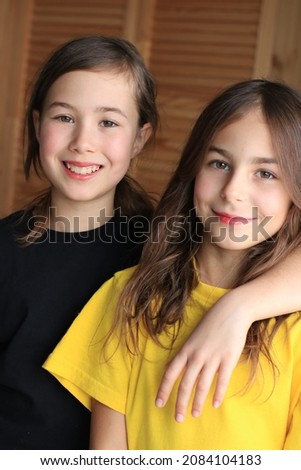 Emotional relationship between  sisters in the portrait. Joy and friendship Royalty-Free Stock Photo #2084104183