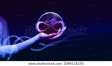 Metaverse Technology concepts. Hand holding virtual reality infinity symbol.New generation technology.Global network technology and  innovation. Elements furnished by NASA. Royalty-Free Stock Photo #2084118250