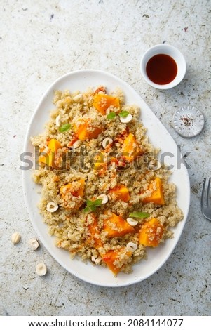 Quinoa with pumpkin and hazelnut
