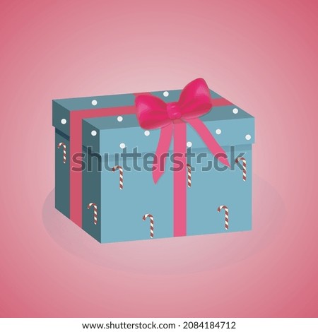 Merry Christmas and Happy New Year. A blue gift box with a pink bow on a light pink background. Holiday gift surprise. Xmas present.