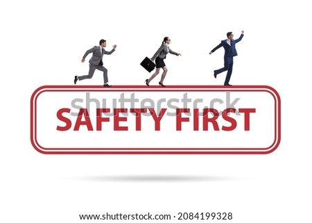 Safety first badge with business people