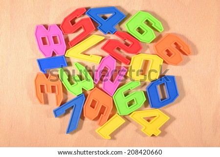 Colorful plastic numbers close up