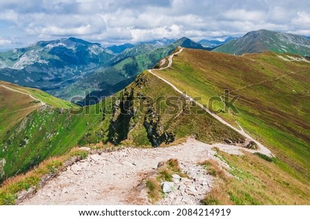 Picturesque hiking trail in Western Tatras (Wielkie Jamy), border Poland, Slovakia. Majestic mountains landscape in Carpathians, Europe. Most wonderful mountain place. Travel and tourism. Royalty-Free Stock Photo #2084214919