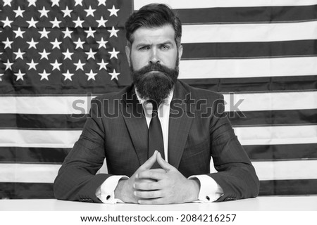 Patriotism, Protection, and Prosperity. his election campaign. brutal businessman is patriotic for usa. education reform at school in july 4. American citizen at USA flag. politician in the election