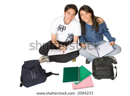 casual students studying on the floor over a white background