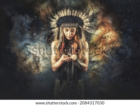 beautiful shamanic girl in cosmic space. Royalty-Free Stock Photo #2084317030