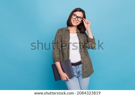 Photo of brainstorming clever manager banker lady touch specs look empty space hold netbook isolated over blue color background Royalty-Free Stock Photo #2084323819