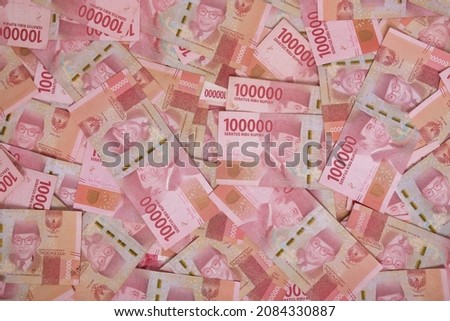 Indonesian rupiah banknotes series with the value of one hundred thousand rupiah IDR 100.000 issued since 2004, Indonesian rupiah for background Royalty-Free Stock Photo #2084330887