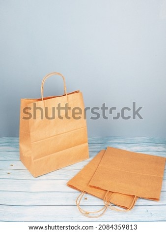 Craft package with handles, Several paper craft bags as ecology, nature protection, we save resources.