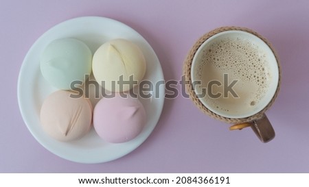 View from above. sweets, cocoa. Cozy picture. Place for text. Pastel shades.