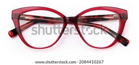 top view red glasses isolated on white background, plastic female spotted spectacle with leopard-print temples Royalty-Free Stock Photo #2084410267