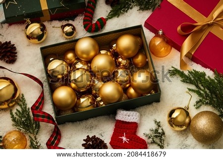 Top view of snow blackground holiday christmas with gift box full of ornament decoration for holiday advertising ,holiday content