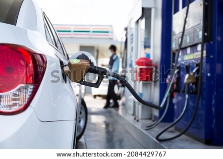 Fuel pumps gasohol, gasoline ,benzine, at a gas station ,price gasoline concept. Royalty-Free Stock Photo #2084429767