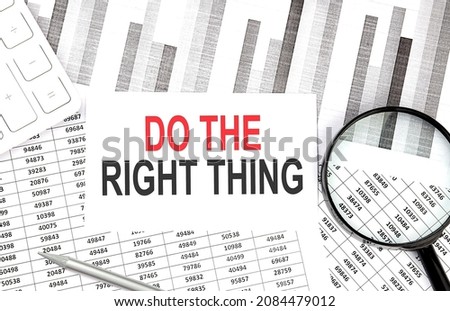 Do The Right Thing text on paper with calculator,magnifier ,pen on the graph background