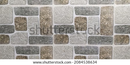 Colorful white, gold and black luxury interior and exterior wall brick block tile stone or cobblestone with copy space. Abstract geometric architecture background texture pattern. Close up macro view.