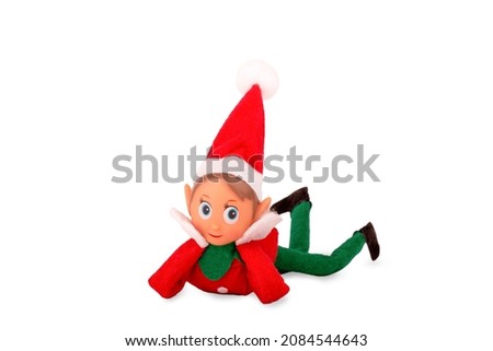 Isolated Christmas Elf toy on a white background with copy space. Christmas spirit, Christmas family tradition.
