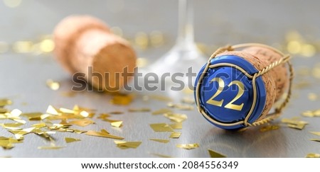 Champagne cap with the Number 22 Royalty-Free Stock Photo #2084556349