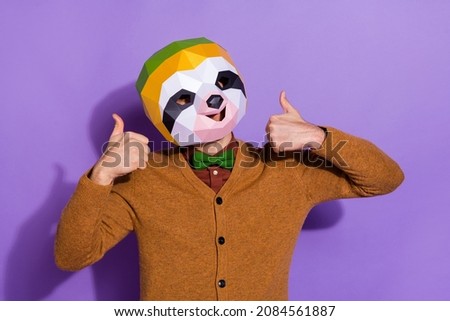 Portrait of weird sloth mask person two hands show thumbs up isolated on violet color background