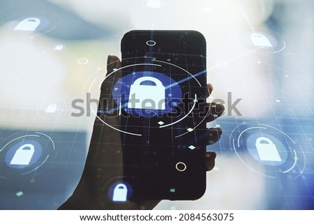 Creative lock illustration with microcircuit and hand with mobile phone on background, cyber security concept. Multiexposure