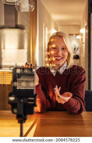 Delighted caucasian woman, connecting to her pen friend online.