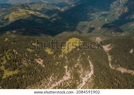 Aerial view of Prat de Cadí, route from Estana in Pyrenees Range, Cerdanya, Catalonia. On arrival you can see the magnificent rocks and the beautiful picture that lets us relax for a while there